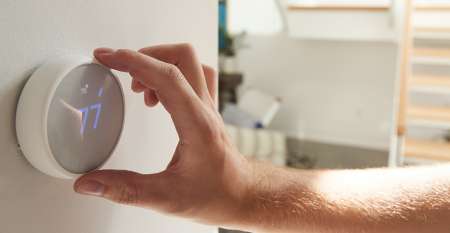 Hand using smart energy hub