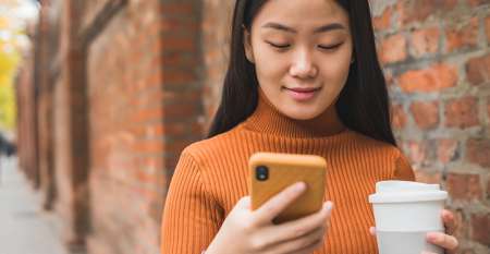 Young woman using mobile phone